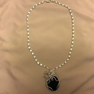 Silver tone necklace and pendant